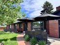 Beautiful brick home with a lovely brick walkway and charming outdoor space at 2774 S Milwaukee St, Denver, CO 80210