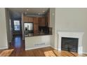 Kitchen features a granite countertop and stainless steel appliances at 8436 E 35Th Ave, Denver, CO 80238