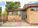 Inviting front porch with seating and landscaping, offering a cozy outdoor space at 2849 E Cresthill Ave, Centennial, CO 80121