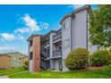 Three-story apartment building with a brick exterior and balconies at 50 19Th Ave # 84, Longmont, CO 80501