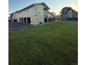 Charming two-story home with a large front lawn and attached garage at 6941 W 87Th Way # 294, Arvada, CO 80003