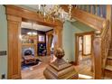 Living room with hardwood floors, fireplace, and wood detailing at 1563 High St, Denver, CO 80218