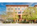 Modern building with a clean design and well-maintained landscaping in a vibrant community at 3295 Blake St # 102, Denver, CO 80205