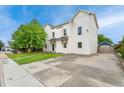 Bright two-story home with a large driveway and a well-manicured lawn that enhances its curb appeal at 13483 Alcott Way, Broomfield, CO 80020