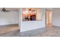 Open concept dining area with kitchen views and tile flooring at 3082 S Wheeling Way # 408, Aurora, CO 80014