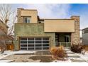 Modern two-story house with a neutral color palette and attached garage at 10081 Truckee St, Commerce City, CO 80022