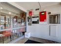 Interior lobby area with seating, bulletin boards, and a view of the outside at 777 N Washington St # 802, Denver, CO 80203