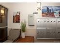 Lobby with seating area, lock boxes, and city-themed artwork at 660 S Alton Way # 12C, Denver, CO 80247
