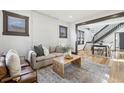 Bright living room featuring hardwood floors and stylish furniture at 1155 Garfield St, Denver, CO 80206