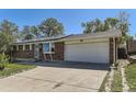 Single Gathering home with an attached garage and a well maintained front lawn at 8258 Cherokee St, Denver, CO 80221