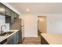 Bright kitchen with stainless steel appliances and plenty of cabinet space at 1302 S Parker Rd # 229, Denver, CO 80231