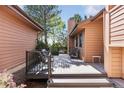 Spacious back deck with multiple seating areas, perfect for entertaining at 7500 E Dartmouth Ave # 8, Denver, CO 80231