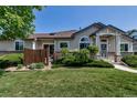 Charming single Gathering home features a well-kept lawn and welcoming front entrance at 18384 E Bethany Pl, Aurora, CO 80013