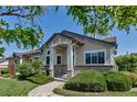 Attractive single Gathering home features a manicured front lawn and charming exterior design at 18384 E Bethany Pl, Aurora, CO 80013