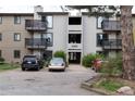 Condominium complex featuring balconies, outdoor parking, and inviting entryways, ideal for comfortable living and community connection at 6505 Kalua Rd # 204B, Boulder, CO 80301