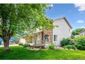 Charming home with a well-maintained lawn and landscaped garden, offering great curb appeal at 5721 S Jellison St, Littleton, CO 80123