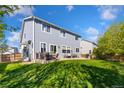 Large backyard with a patio, perfect for outdoor entertaining at 16478 Marion St, Thornton, CO 80602