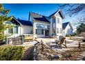 Spacious backyard with hot tub and patio area at 935 Green Gables Cir, Bennett, CO 80102