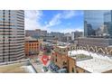 High-angle view of building and surrounding Denver city blocks, highlighting its urban setting at 1617 California St # 3B, Denver, CO 80202