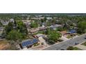 A beautiful aerial view of a quiet residential neighborhood with tree-lined streets at 1229 W 102Nd Ave, Northglenn, CO 80260