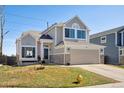 Charming two-story home featuring a two-car garage, stone accents, and well-maintained landscaping at 618 S Carlton St, Castle Rock, CO 80104