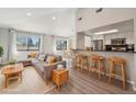 Comfortable living room with modern furnishings, an open layout, and ample natural light at 540 S Forest St # 3-204, Denver, CO 80246