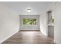 Bright dining area with natural light and hardwood floors at 10724 E Maplewood Pl, Englewood, CO 80111