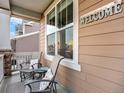 Inviting front porch with seating, offering a cozy spot to relax and enjoy the neighborhood views at 1297 Black Haw St, Elizabeth, CO 80107
