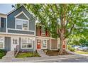Inviting townhomes featuring unique architectural details and mature trees at 1068 Milo Cir # A, Lafayette, CO 80026