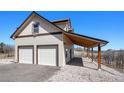 Two-story home with a two-car garage and gravel landscaping at 1091 Colt Cir, Castle Rock, CO 80109