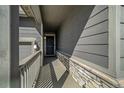 Inviting covered front porch leads to this home, with stone accents at 2237 Barela Dr, Berthoud, CO 80513