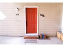 Charming front entrance with a vibrant orange door and decorative accents at 4945 Twin Lakes Rd # 44, Boulder, CO 80301