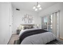 Spacious bedroom with access to a private balcony at 3000 Blue Sky Cir # 11-108, Erie, CO 80516