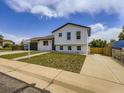 Charming two-story home with a well-maintained front yard, driveway, and inviting curb appeal at 2830 E 99Th Way, Thornton, CO 80229