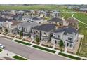 Aerial view of a well-maintained community with green spaces and sidewalks at 5347 Warrior St, Frederick, CO 80504
