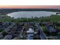 Aerial shot of a home near Sloan's Lake, showcasing the beautiful surrounding neighborhood and green space at 1655 Wolff St, Denver, CO 80204