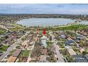 Wonderful aerial view showcasing neighborhood and nearby lake, offering a serene and picturesque setting for your new home at 1655 Wolff St, Denver, CO 80204
