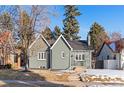 Beautiful craftsman home with a well-manicured lawn and updated curb appeal at 440 S York St, Denver, CO 80209