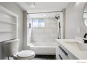 Contemporary bathroom with a shower-tub, modern vanity, and stylish white and black color scheme at 5138 W 46Th Ave, Denver, CO 80212