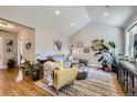 Inviting living room with vaulted ceilings, hardwood floors, and stylish decor for relaxation and entertainment at 2841 N Columbine St, Denver, CO 80205