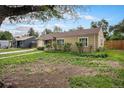 Attractive single-story home with a well-maintained yard and charming curb appeal on a sunny day at 4906 E Bates Ave, Denver, CO 80222