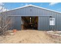 Large, well-equipped barn providing ample space for storage and equestrian activities at 5700 S University Blvd, Greenwood Village, CO 80121