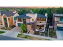 Modern home with rooftop deck, situated in a quiet neighborhood at 7036 E Archer Pl, Denver, CO 80230