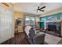 Living room with fireplace and comfortable seating at 16845 Buffalo Valley Path, Monument, CO 80132