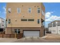 Spacious garage of a modern home with a neutral exterior and a private driveway at 3142 W 20, Denver, CO 80211