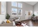 Bright living room featuring a cozy seating area and an abundance of natural light at 6450 W 44Th Pl # B-3, Wheat Ridge, CO 80033