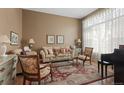 Cozy living room with natural light, comfortable seating, and stylish decor at 11615 E Maplewood Ave, Englewood, CO 80111