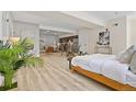 Spacious open-concept bedroom features a small sitting area, kitchen and dining area at 2901 N Wyandot St # 19, Denver, CO 80211