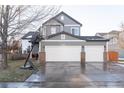 Charming two-story home with a three-car garage and well-maintained exterior at 10935 Acadia, Parker, CO 80138