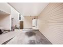 View of carport and covered entry at 1529 S Sable Blvd # C, Aurora, CO 80012